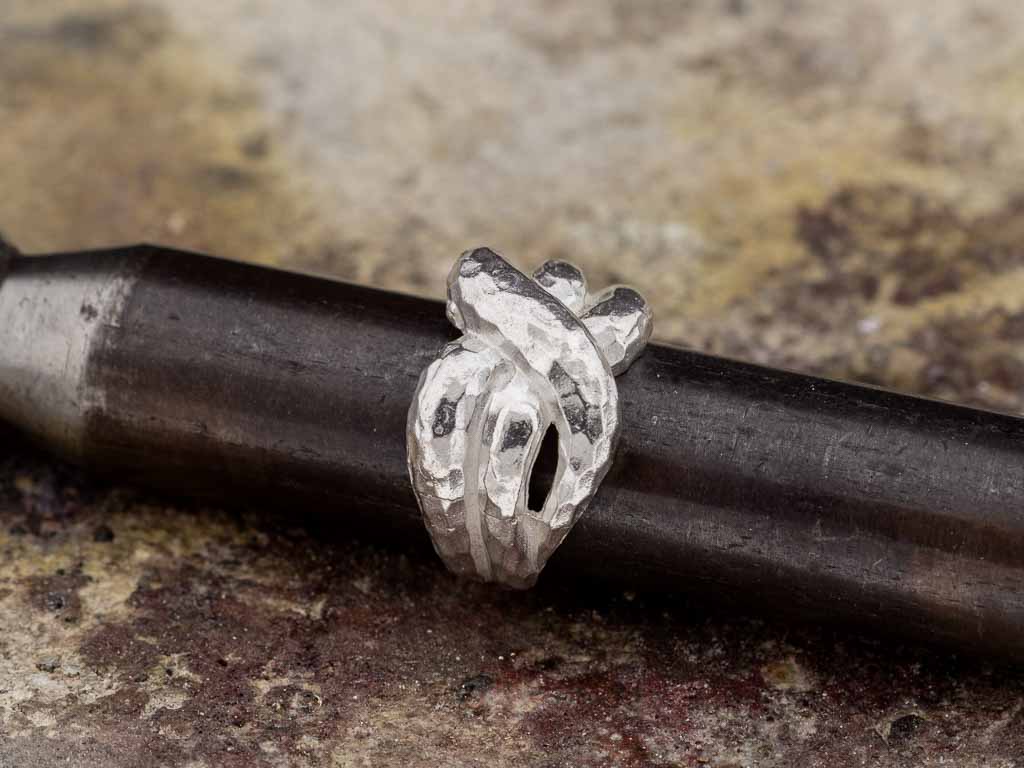 INTERTWINED | Sterling Silver ring with distinct hammered surface