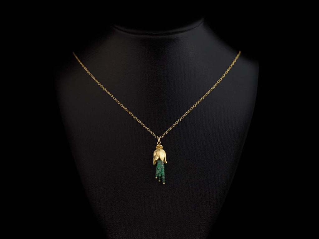Colombian Shaded Emerald Gold necklace with gold flower (sold out)